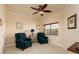Cozy sitting room with comfortable seating, neutral walls, and natural light at 7040 Key Haven Rd # 601, Seminole, FL 33777