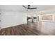 A large open living space flows between the living area and the kitchen at 7327 Jasmine Blvd, Port Richey, FL 34668