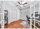 Bright office with hardwood floors, plantation shutters, and ample closet space, perfect for remote work or study at 7414 Mint Julep Dr, Riverview, FL 33578