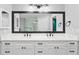 Bathroom showcasing a double vanity with quartz countertop and matte black hardware at 7902 River Ridge Dr, Temple Terrace, FL 33637
