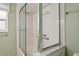 Bathroom with a glass door shower at 8350 Monarch Cir, Seminole, FL 33772