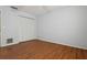 Bedroom with ample closet space and hardwood floors at 8350 Monarch Cir, Seminole, FL 33772