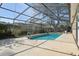 Relax in this large screened-in pool with deck and patio, perfect for outdoor entertaining at 8350 Monarch Cir, Seminole, FL 33772
