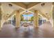 Inviting outdoor seating area with a table and chairs, offering scenic views of nearby buildings at 865 S Gulfview Blvd # 306, Clearwater Beach, FL 33767