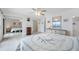 Bedroom features an ocean view, mirrored closet, and beach-themed bedding at 865 S Gulfview Blvd # 306, Clearwater Beach, FL 33767
