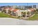 Picturesque beachfront condos with private balconies and lush tropical landscaping at 865 S Gulfview Blvd # 306, Clearwater Beach, FL 33767