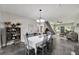 Dining room leading to the living room and staircase at 9019 S County Line Rd, Lithia, FL 33547