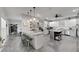 Spacious, open-concept kitchen featuring a large island with seating and modern appliances at 9019 S County Line Rd, Lithia, FL 33547