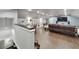 Wide-open living area featuring hard wood floors, recessed lights, and a media center at 9019 S County Line Rd, Lithia, FL 33547