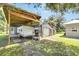 Exterior shot featuring RV parking and several outbuildings and storage units at 9019 S County Line Rd, Lithia, FL 33547