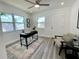 Bright home office featuring a modern desk, a ceiling fan and lots of natural light at 9308 45Th N St, Pinellas Park, FL 33782