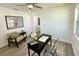 Comfortable home office with stylish decor, a ceiling fan, and natural light at 9308 45Th N St, Pinellas Park, FL 33782