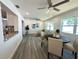 Inviting living area featuring a dining table and seamless flow to other living spaces at 9308 45Th N St, Pinellas Park, FL 33782