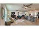 Open concept living room and kitchen with modern furnishings and plenty of natural light at 9308 45Th N St, Pinellas Park, FL 33782