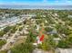 Aerial view displays the property near the coast, close to neighborhood and waterway at 121 Pennsylvania Ave, Palm Harbor, FL 34683