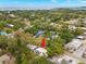 A bird's eye view displays the property and neighboring yard at 121 Pennsylvania Ave, Palm Harbor, FL 34683