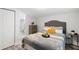 Cozy bedroom with a comfortable bed, soft linens, and an ensuite bathroom for added privacy at 121 Pennsylvania Ave, Palm Harbor, FL 34683