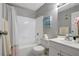 Clean bathroom features shower and tub combo with curtain, vanity, and neutral colors at 1400 Gandy N Blvd # 1701, St Petersburg, FL 33702