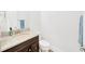 Bathroom featuring a granite countertop, modern fixtures, and clean design at 14174 Thoroughbred Dr, Dade City, FL 33525