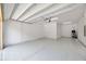 Bright and roomy two-car garage with epoxy flooring and a clean, well-lit interior at 14174 Thoroughbred Dr, Dade City, FL 33525