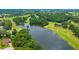 Gorgeous golf course with a serene lake and picturesque landscape at 14174 Thoroughbred Dr, Dade City, FL 33525