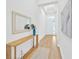 Hallway with a table and a flower vase at 14174 Thoroughbred Dr, Dade City, FL 33525