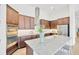 Kitchen featuring wooden cabinets and stainless steel appliances at 14174 Thoroughbred Dr, Dade City, FL 33525