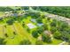 Enjoy community living with pickleball, basketball courts, playground and green spaces, perfect for families at 14174 Thoroughbred Dr, Dade City, FL 33525
