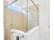 Elegant shower features frameless glass and a rainfall shower head at 14174 Thoroughbred Dr, Dade City, FL 33525