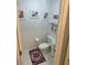 Well-lit half bath with decorative accents and a neutral color scheme, conveniently located at 14334 Teasdale Ave, Hudson, FL 34667
