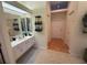Functional bathroom with a modern sink and white cabinets, perfect for everyday convenience at 14334 Teasdale Ave, Hudson, FL 34667