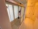 Bathroom with a sliding door shower, white tile, and natural light at 14334 Teasdale Ave, Hudson, FL 34667