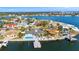 Aerial shot showcases a waterfront home with pool and dock in a beautiful neighborhood at 1493 Sea Gull S Dr, St Petersburg, FL 33707