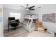 bedroom featuring a bunk bed, a desk with computer, and playful decor at 1493 Sea Gull S Dr, St Petersburg, FL 33707