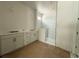 Bathroom featuring a double vanity and a modern, glass-enclosed shower at 1828 27Th N Ave, St Petersburg, FL 33713