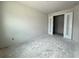 Empty bedroom space with double doors and neutral walls ready for personalization at 1828 27Th N Ave, St Petersburg, FL 33713