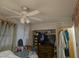 Bedroom with decorated walls, functional closet space, and a well-lit interior at 1991 63Rd N Ave, St Petersburg, FL 33702