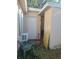 Backyard exterior showing the out building with exterior door and a window at 1991 63Rd N Ave, St Petersburg, FL 33702