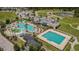 Aerial view of community amenities including resort style pool, lap pool and clubhouse at 20142 Lace Cascade Rd, Land O Lakes, FL 34637