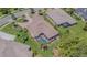 Aerial view of the property featuring a screened-in pool and backyard at 20142 Lace Cascade Rd, Land O Lakes, FL 34637