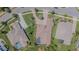 Aerial view of the property showcasing manicured landscaping and a private backyard pool at 20142 Lace Cascade Rd, Land O Lakes, FL 34637