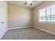 Bedroom with a ceiling fan and a window with blinds at 20142 Lace Cascade Rd, Land O Lakes, FL 34637