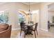 Cozy breakfast nook featuring a window to the lanai, providing a serene space for meals at 20142 Lace Cascade Rd, Land O Lakes, FL 34637