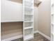 Well-organized closet featuring ample shelving and storage space for clothes and accessories at 20142 Lace Cascade Rd, Land O Lakes, FL 34637