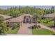 A charming single-story home featuring a well-manicured lawn and mature landscaping at 20142 Lace Cascade Rd, Land O Lakes, FL 34637
