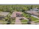 Beautiful home with a circular driveway, lush landscaping, and elegant entrance in a Gathering-friendly neighborhood at 20142 Lace Cascade Rd, Land O Lakes, FL 34637