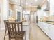 A gourmet kitchen boasts granite counters, stainless appliances, and pendant lighting at 20142 Lace Cascade Rd, Land O Lakes, FL 34637