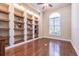 Office with hardwood floors, built-in shelving, recessed lighting, and a ceiling fan at 20142 Lace Cascade Rd, Land O Lakes, FL 34637