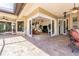A luxurious outdoor patio with a view into the living space, ideal for relaxation and entertainment at 20142 Lace Cascade Rd, Land O Lakes, FL 34637