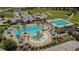 Community resort-style pool area with splashpad, lap pool, and plenty of space to relax and play in the Florida sunshine at 20142 Lace Cascade Rd, Land O Lakes, FL 34637